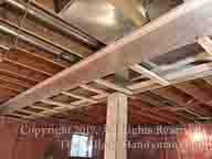 shows how heating ducts are being framed for drywall