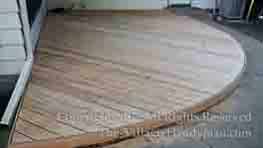 Curved deck completed in Naperville Newly built rear exterior patio deck with bent circular curve