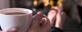 person relaxing and enjoying new fireplace